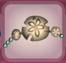 Soft Orange Sand Dollar Headband with Seedling Green Trim.png